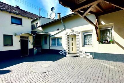 Saarbrücken-Altenkessel Mehrfamilienhaus mit 2 Ladenlokalen