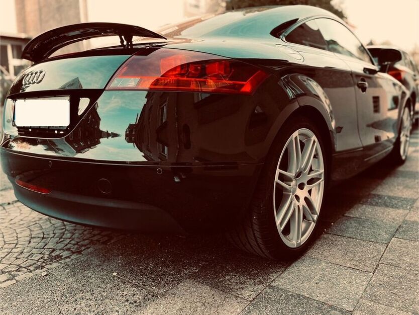 TT