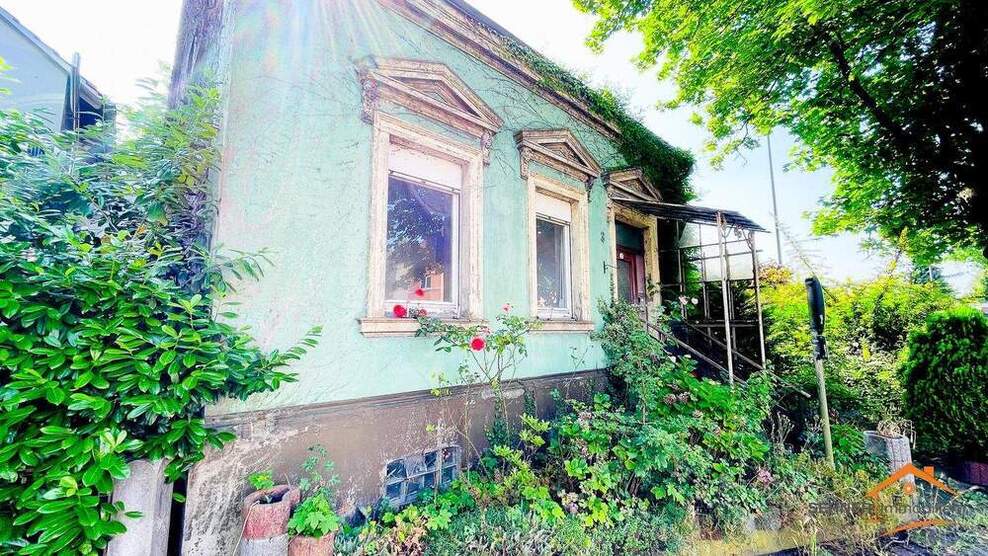 Hamm Mitte - Sanierungsbedürftiges freistehendes Einfamilienhaus mit Garten und Garage