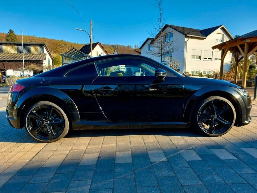 TT