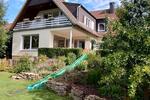 Teilsaniertes Einfamilienhaus auf großem Grundstück