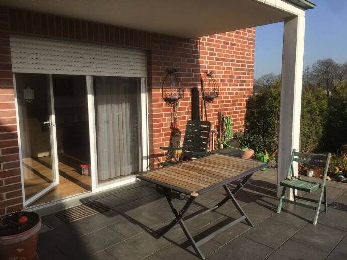 Wohnung im Erdgeschoss mit Terrasse und Gartenanteil