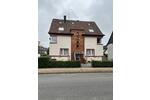 Mehrfamilienhaus mit Garten und 7 Garagen