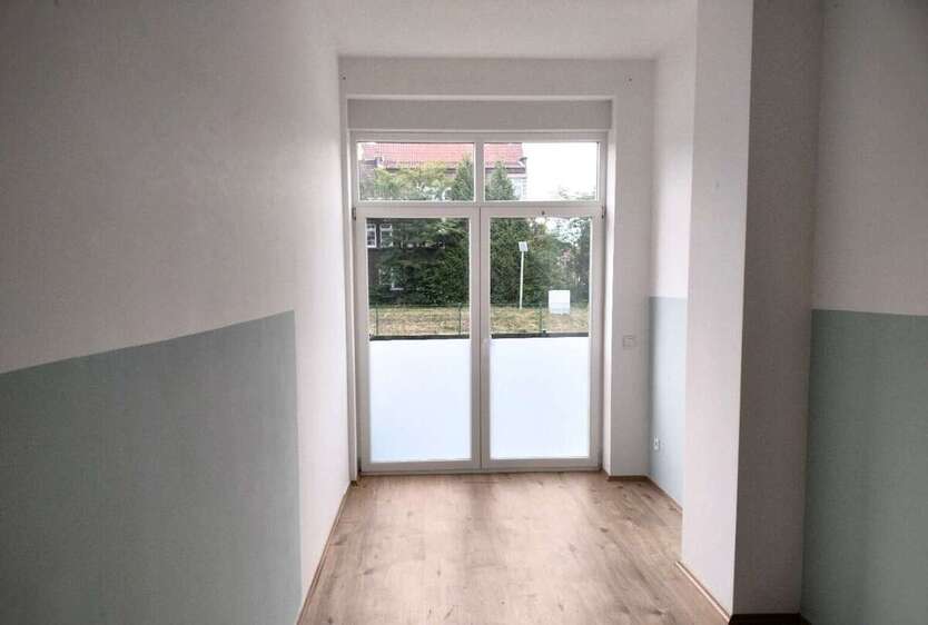 Exklusive Kapitalanlage: Vermietete Erdgeschosswohnung mit Privatgarten und stabilen Mieteinnahmen 2.5 zimmer