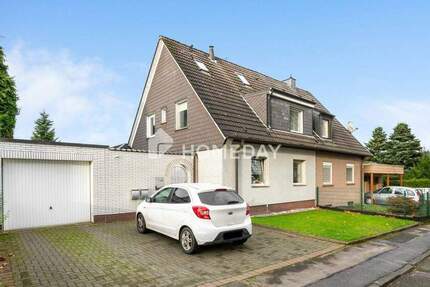 Charmante Doppelhaushälfte mit großem Grundstück und modernem Wohnkomfort 6 zimmer