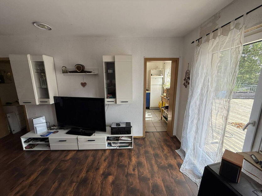 2,5-Zimmer Eigentumswohnung mit fast 100 m² Dachterrasse